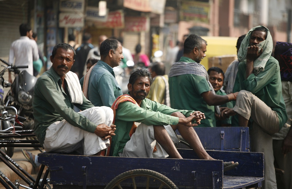 Porters without work in Chandni Chowk, Delhi. Photo: Anil Shakya