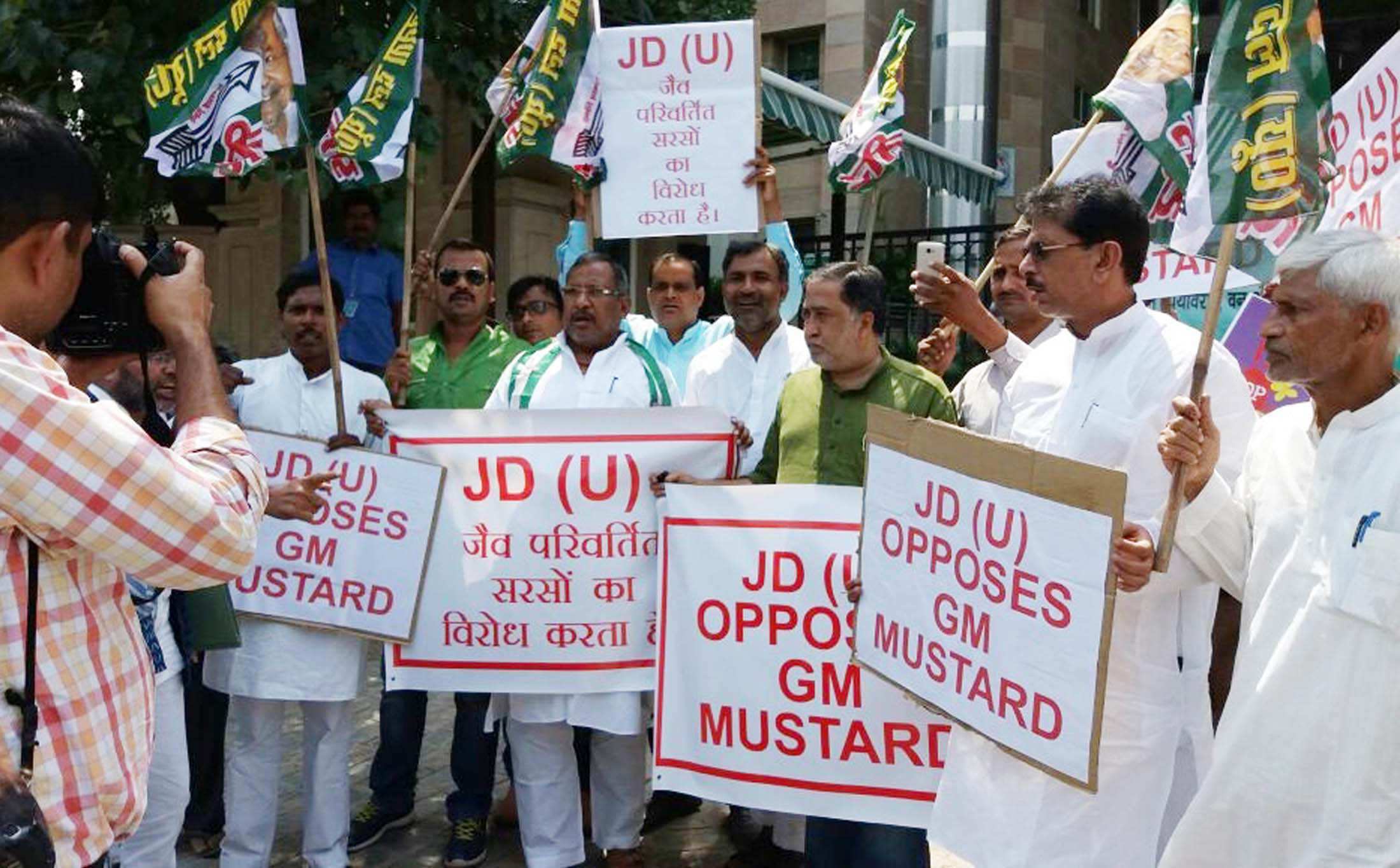 JD(U) leaders demonstrate against GM mustard in New Delhi. Photo: UNI