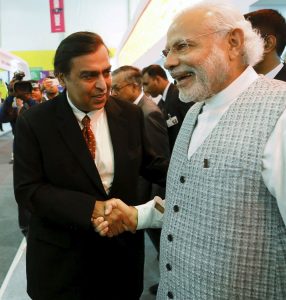 Chairman and MD of RIL, Mukesh Ambani with Prime Minister Narendra Modi. RIL has seized the chance to launch Jio payments, in a joint venture with SBI