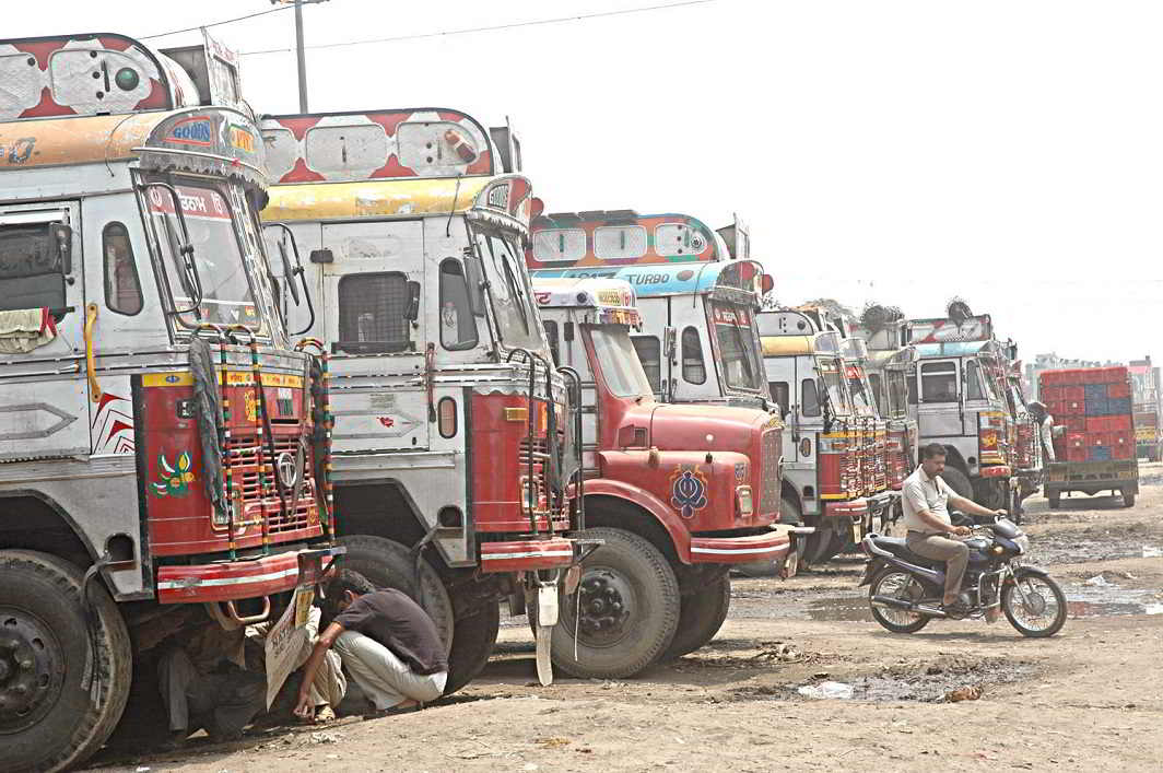 Trucks await clearance at an inter-state checkpost.