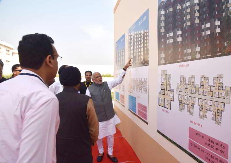 Prime Minister Narendra Modi launching the Pradhan Mantri Awas Yojana housing scheme for the poor
