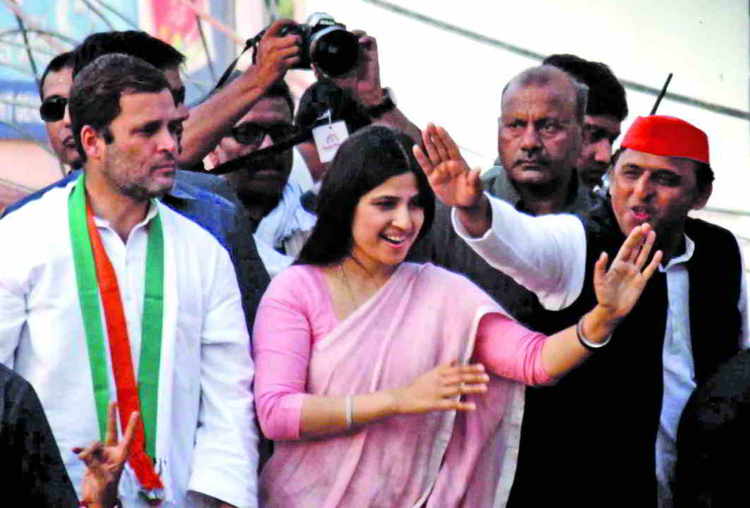 Former UP chief minister and SP president Akhilesh Yadav (far right) with wife Dimple and Congress vice-president Rahul Gandhi during a road show in Varanasi