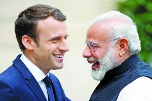Prime Minister Modi with French President Emmanuel Macron in Paris. Photo: UNI