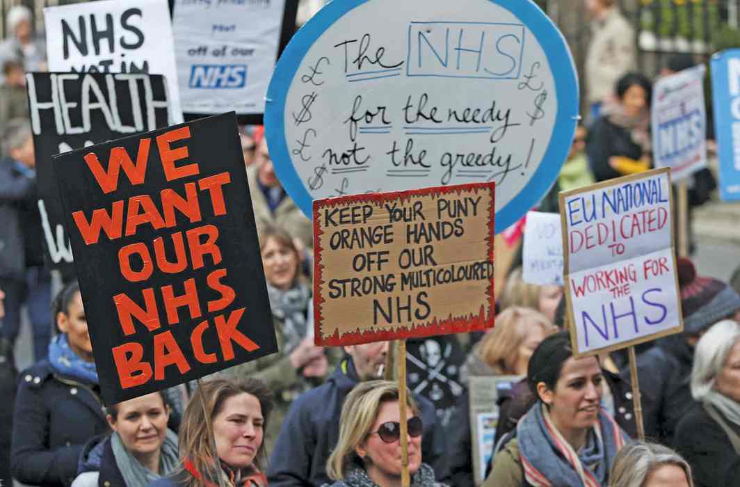 People demonstrating in London for more funding for NHS. Photo: UNI
