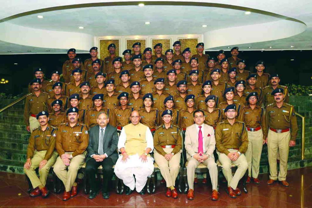 Union Home Minister, Rajnath Singh with the Indian Police Service Officer Trainees. Photo: UNI