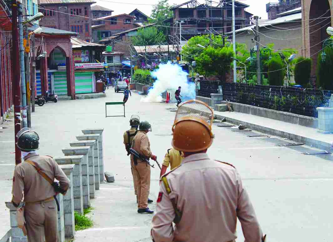 Smoke coming out from a shell fired by security personnel in Srinagar. Photo: UNI