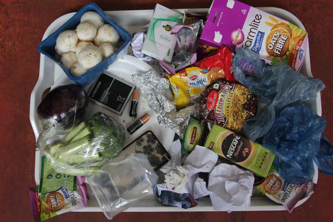 Food leftovers, plastic wrappers, tetra packs, batteries and so on that make up daily waste. Photo: UNI