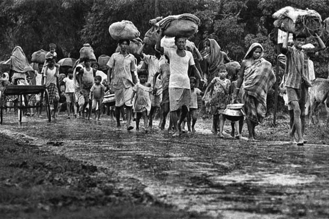 Bangladeshi Hindus trudge to India during the 1971 war; despite huge migration, they still comprise close to nine percent of the population. Photo: www.defencebd.com