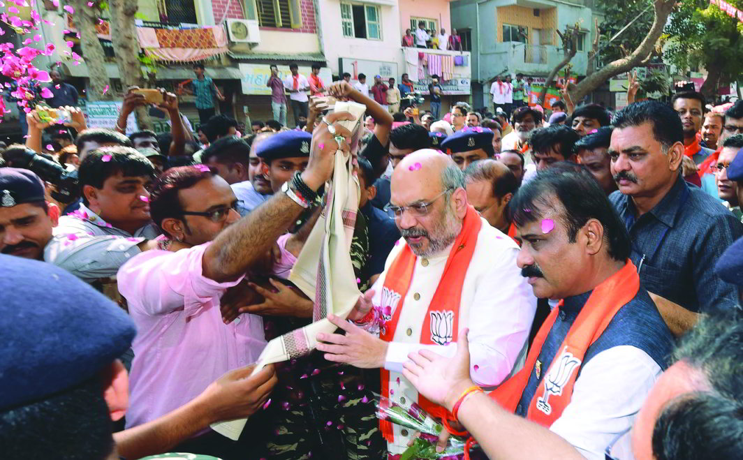 BJP national president Amit Shah on a campaign trail in Ahmedabad. Photo: UNI