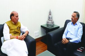 Home minister Rajnath Singh and (right) Tihar Jail DG Ajay Kashyap