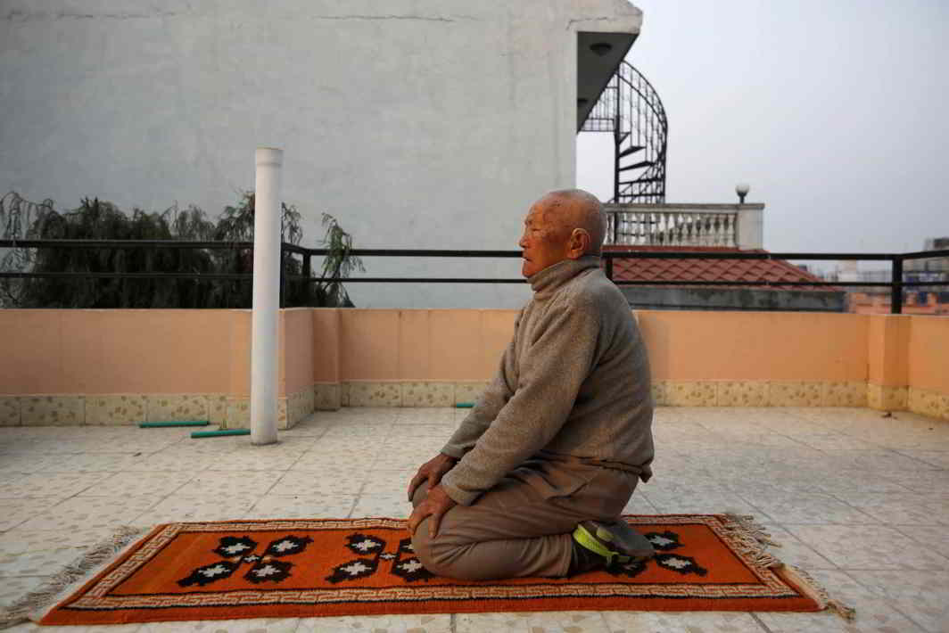MIND OVER MATTER: Nepali mountain climber Min Bahadur Sherchan, 85, who will attempt to climb Everest to become the oldest person to conquer the world's highest mountain, performs yoga in Kathmandu, Reuters/UNI