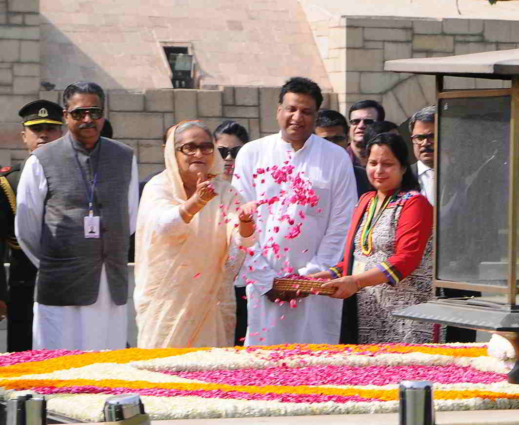 RESPECT: Prime Minister of Bangladesh Sheikh Hasina pays floral tributes at the Samadhi of Mahatma Gandhi, at Rajghat, in Delhi, UNI