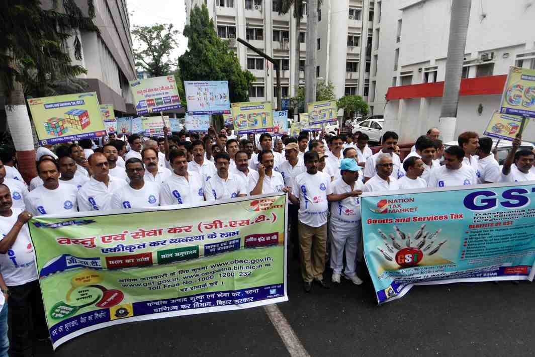 KNOW YOUR TAXES: Officers of the Central Excise and Service Tax department participate in an awareness march for Goods and Service Tax in Patna, UNI