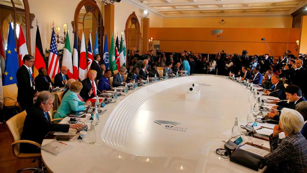 WHERE DECISIONS ARE MADE: The discussion table at the G7 Summit expanded session in Taormina, Sicily, Reuters/UNI