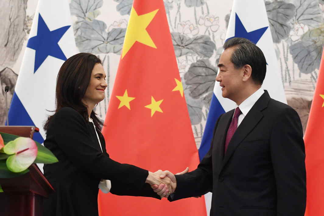 POLICY PARLEY: Panama's foreign minister Isabel de Saint Malo (left) shakes hands with Chinese foreign minister Wang Yi during a joint press briefing in Beijing, China, Reuters/UNI
