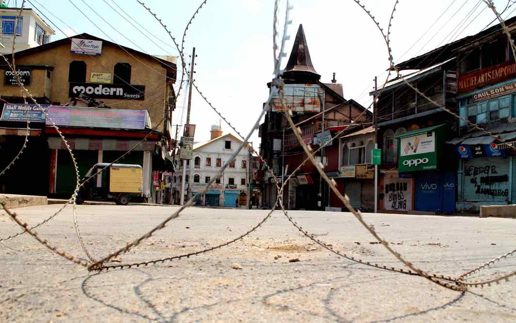 VALLEY OF REGRETS: Concertina wire laid to block Amirakadal bridge as a curfew was imposed following a bandh call given by separatists on the first death anniversary of Hizbul Mujahideen commander Burhan Wani, UNI