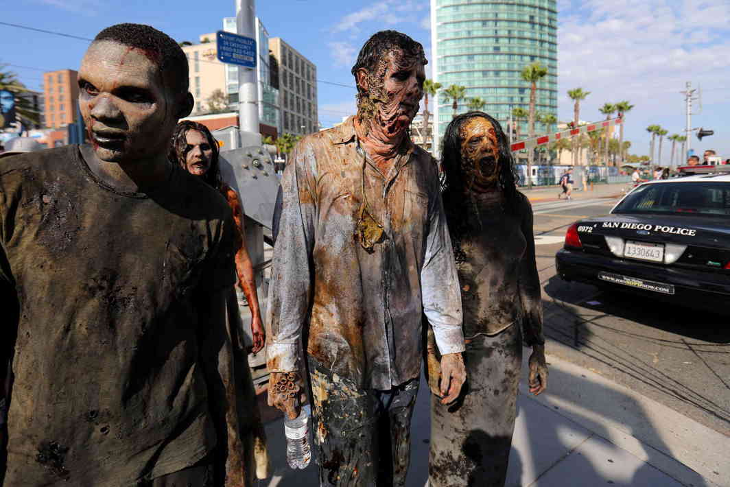 COSPLAYERS AHOY: A group of zombies arrive in costume as they participate in the opening preview night at Comic Con International in San Diego, California, Reuters/UNI