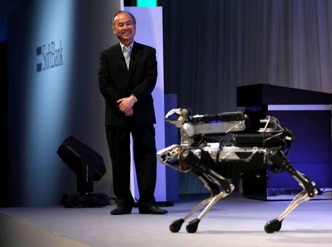 CLEVER TOYMAKER: SoftBank Group Corp chairman and CEO Masayoshi Son reacts to a demonstration of Boston Dynamics' SpotMini robot at SoftBank World 2017 conference in Tokyo, Japan, Reuters/UNI
