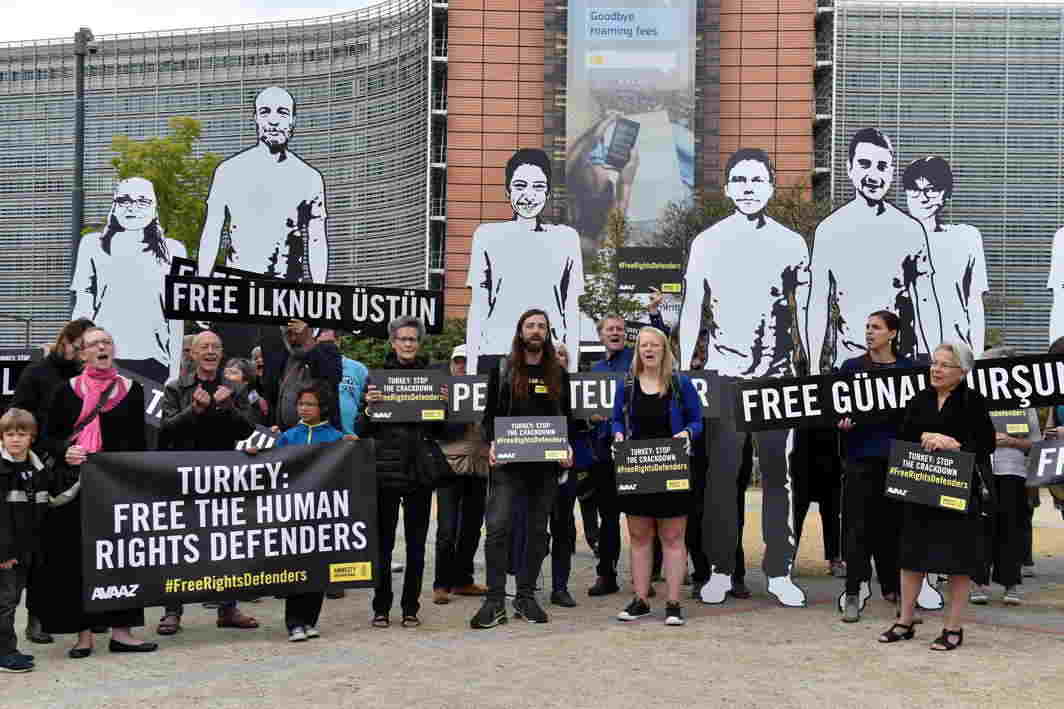 JAILED ABROAD: People take part in a protest organised by Amnesty International outside the EU commission asking the release of activists who were detained in Turkey, in Brussels, Reuters/UNI