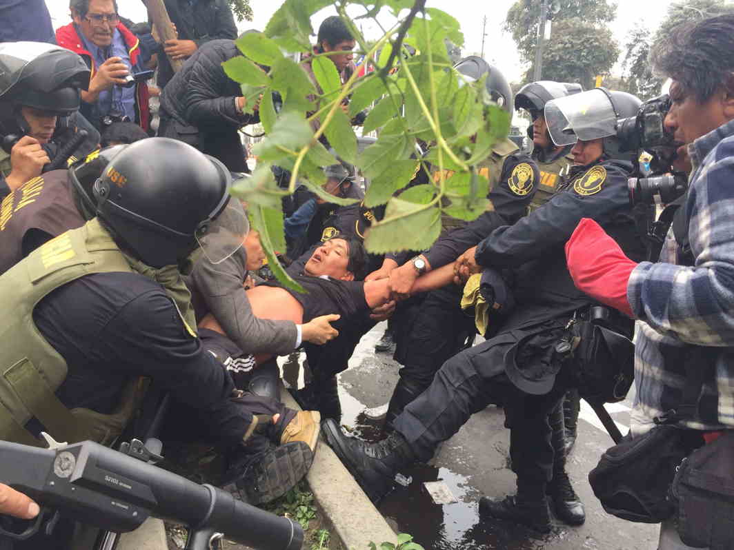 NO RESPECT: Union workers of education clash with riot police during a demonstration for improvement in the wages of educators, in Lima, Peru, Reuters/UNI