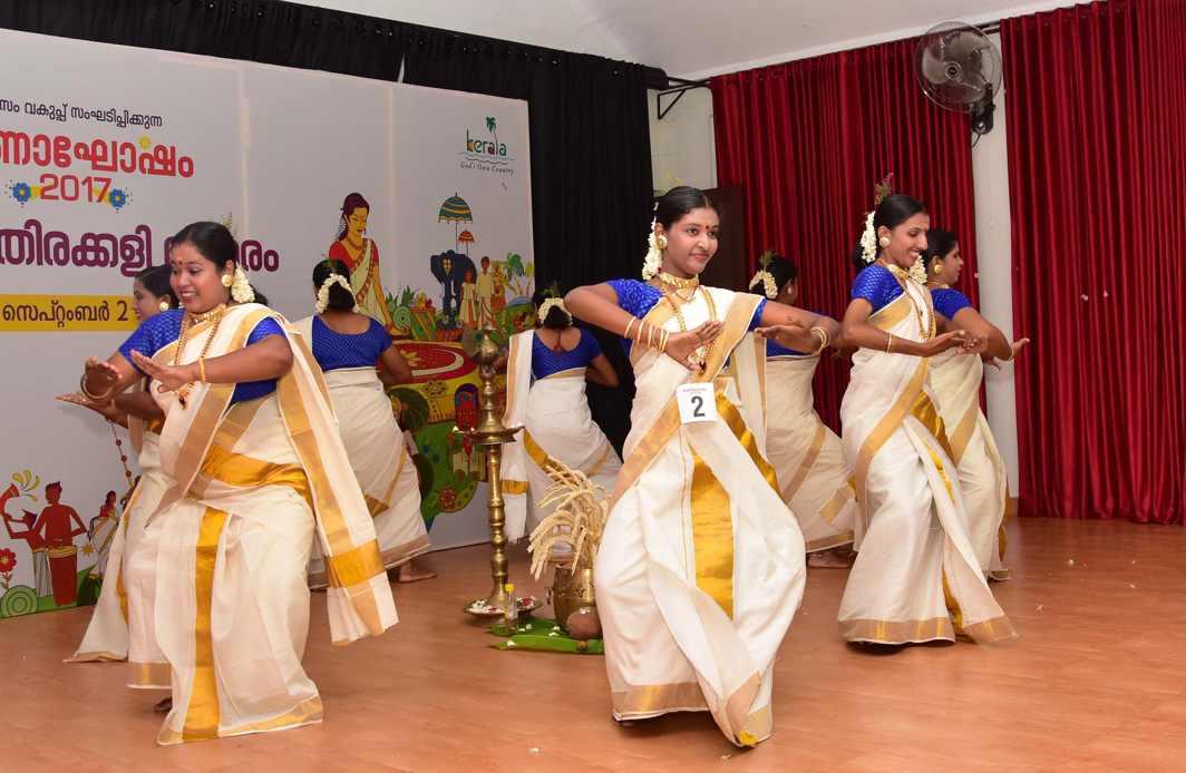 AUSPICIOUS COLOURS: Women participate in the Thiruvathira dance competition, as part of Onam festival celebrations, in Thiruvananthapuram, UNI