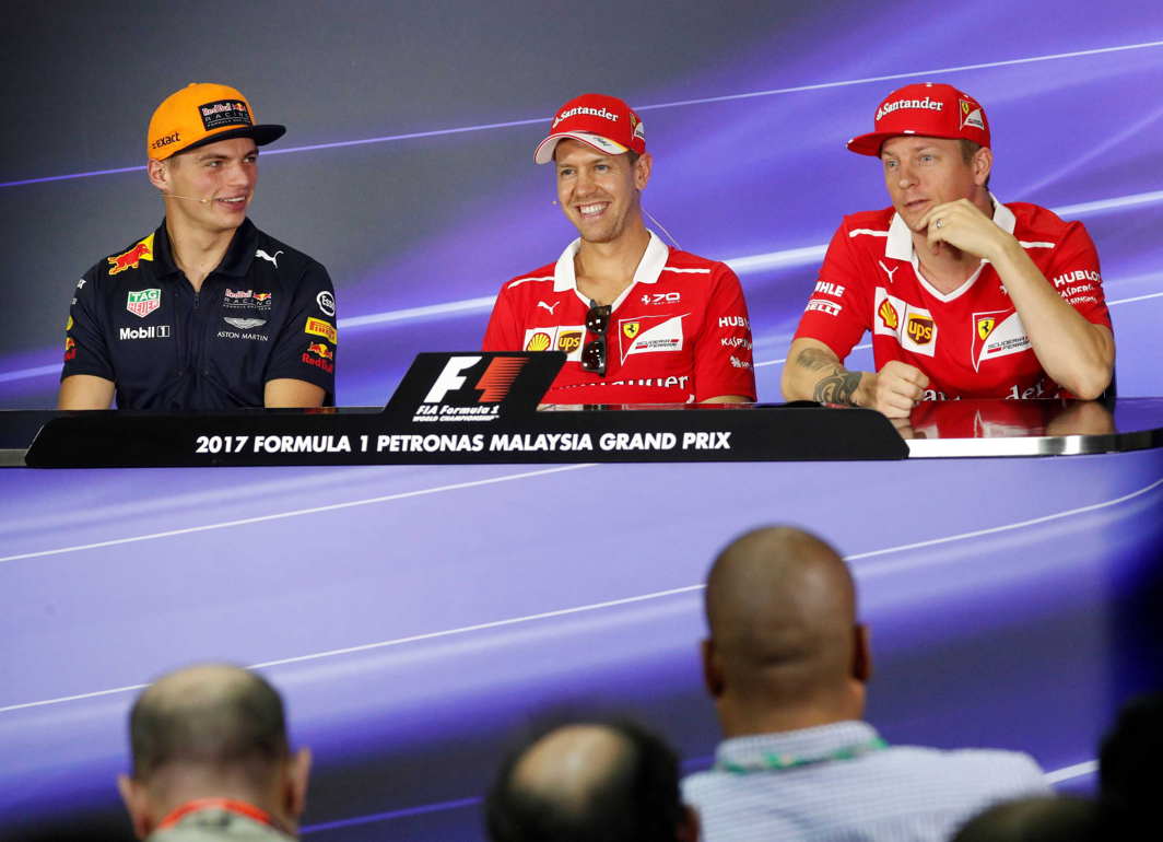 HEAT IS ON: Redbull's Max Verstappen, Ferrari's Sebastian Vettel and Kimi Raikkonen speak at a news conference during Malaysia Grand Prix 2017, Reuters/UNI