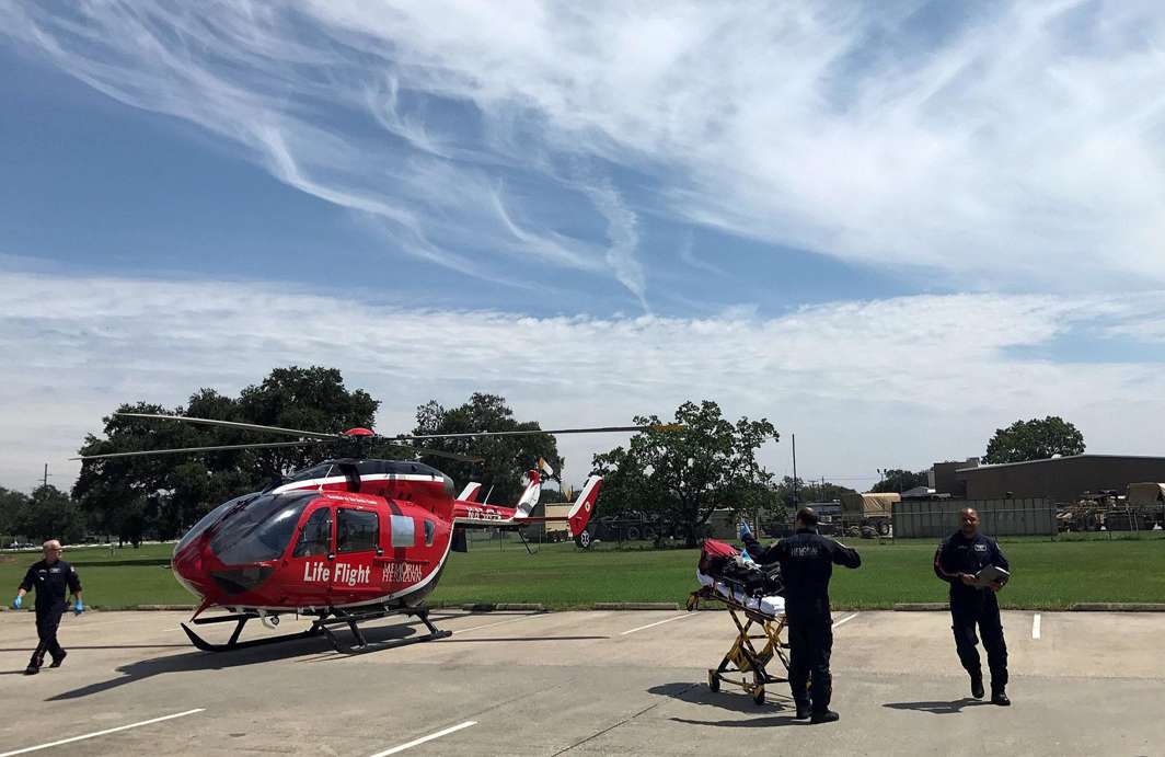 PRESSED INTO SERVICE: Life Flight, a critical care air medical transport service, is seen assisting evacuation due to lack of running water at the Baptist Beaumont Hospital, in Beaumont, Texas, US, reuters/UNI