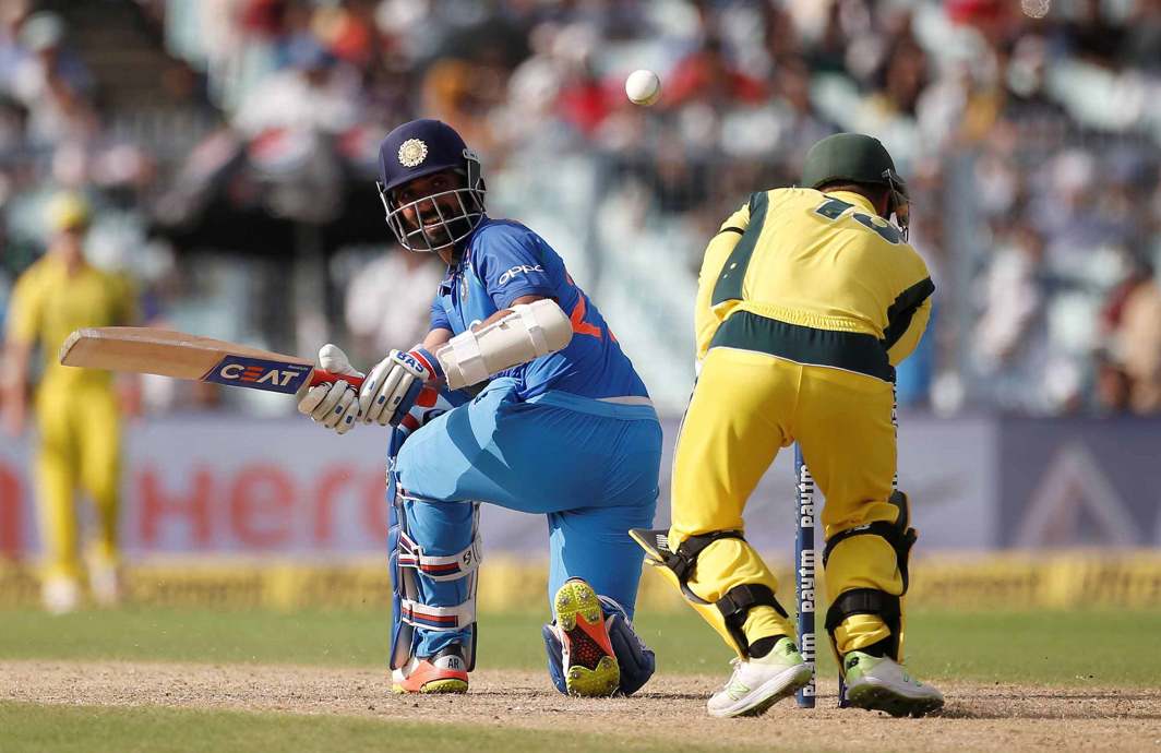 REVERSE SWEEP: Ajinkya Rahane plays a shot during the second one-day international between India and Australia in Kolkata, Reuters/UNI