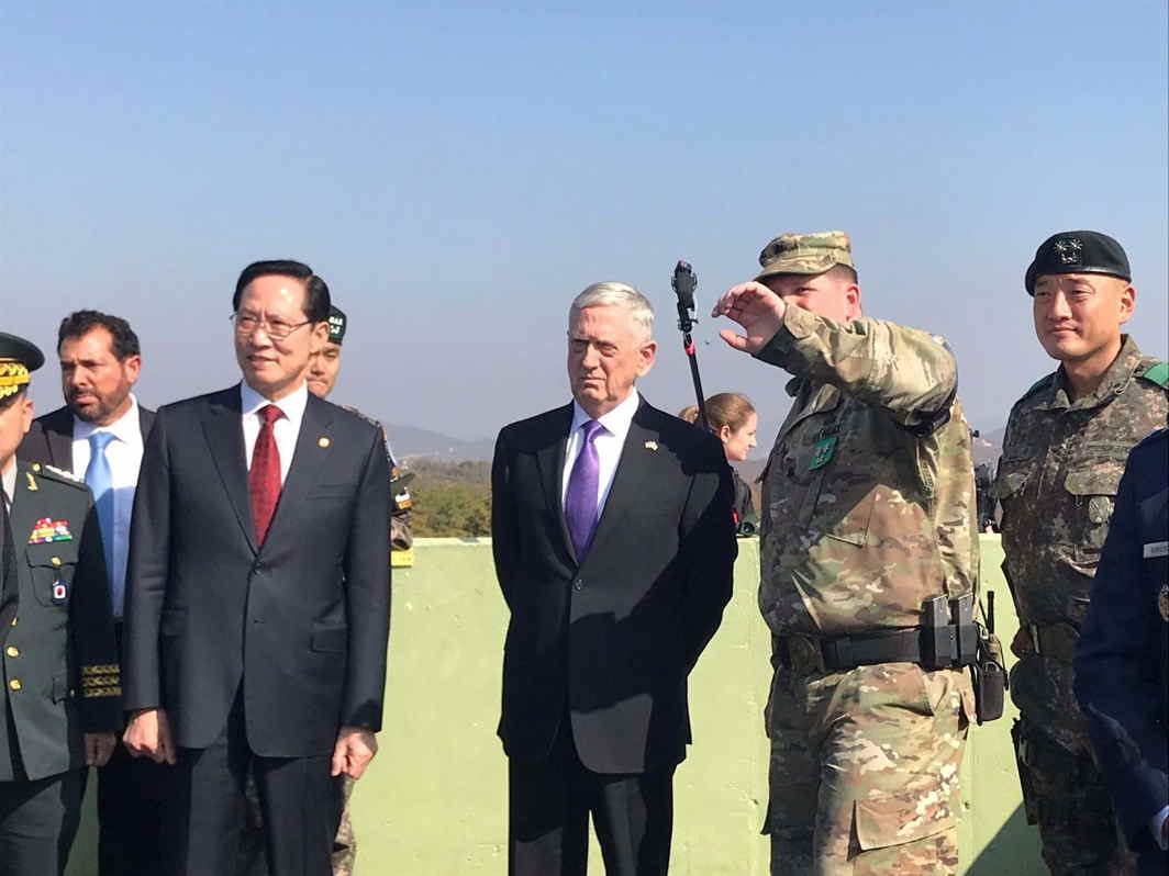 BORDER VIEW: US defence secretary Jim Mattis and his South Korean counterpart Song Young-moo peer into North Korea from Observation Post Ouellette in the demilitarized zone separating North and South Korea, Reuters/UNI