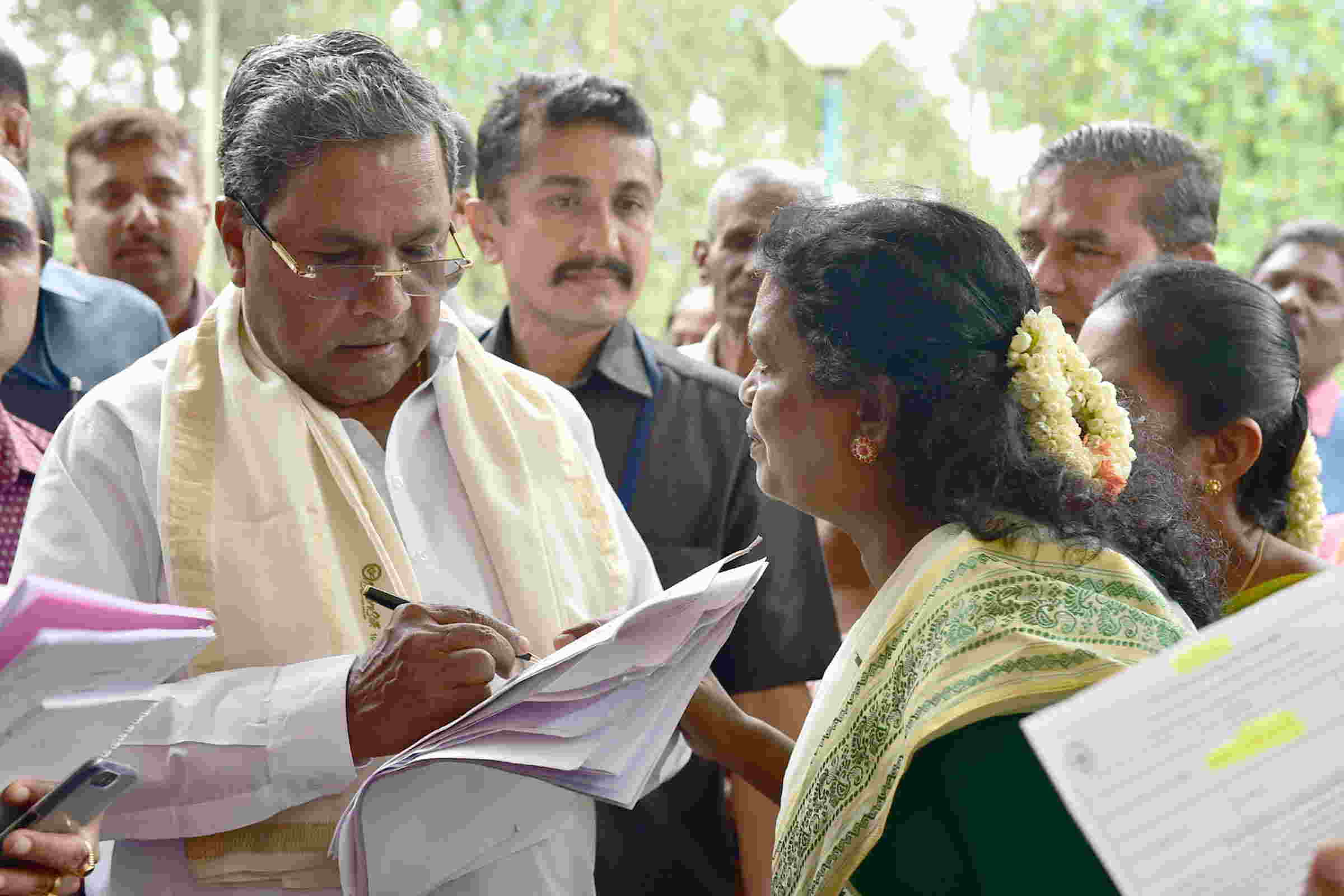 EAR TO THE GROUND: Karnataka Chief Minister Siddaramaiah hears public grievances at Cauvery in Bengaluru, UNI