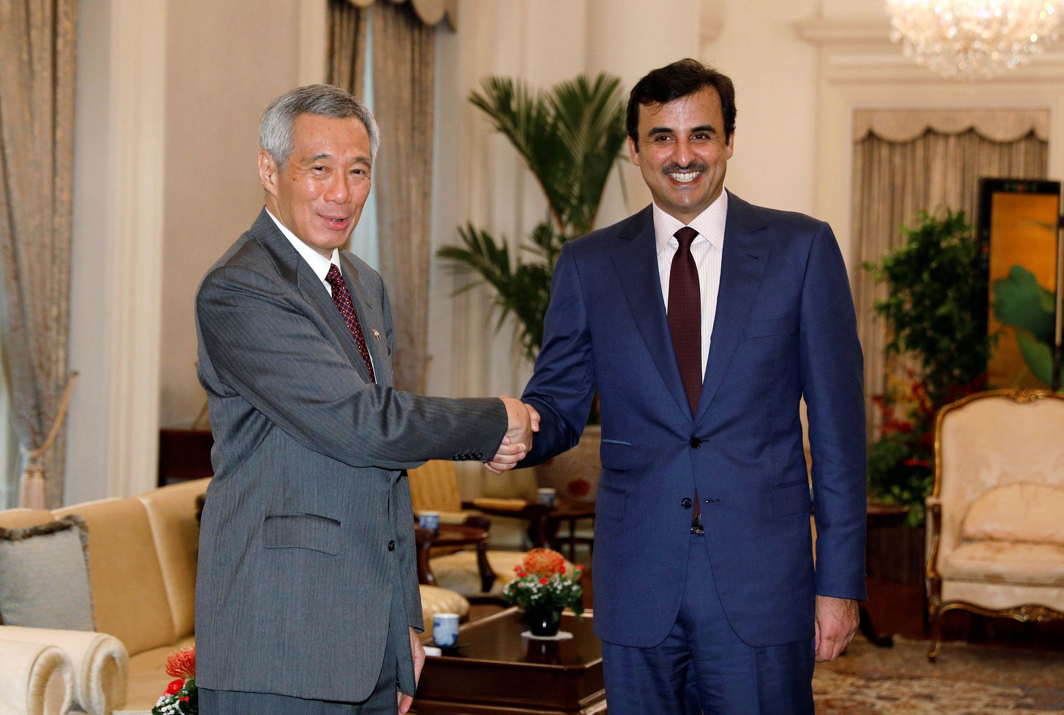 HERE WE ARE: Qatar's Emir Sheikh Tamim bin Hamad al-Thani meets with Singapore's Prime Minister Lee Hsien Loong at the Istana in Singapore, Reuters/UNI