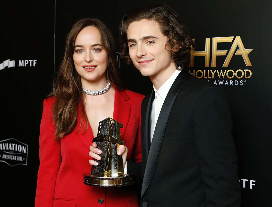 PRETTY PAIR: Dakota Johnson and Timothee Chalamet with his Hollywood Breakout Performance Actor Award for "Call Me By Your Name" during the 21st Annual Hollywood Film Awards Photo Room, Beverly Hills, California, US, Reuters/UNI