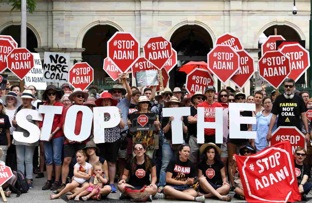 THREAT FROM INDIA: Anti-Adani protesters protest outside Queensland's Parliament House in Brisbane, Australia, Bradley Kanaris/AAP/Reuters/UNI