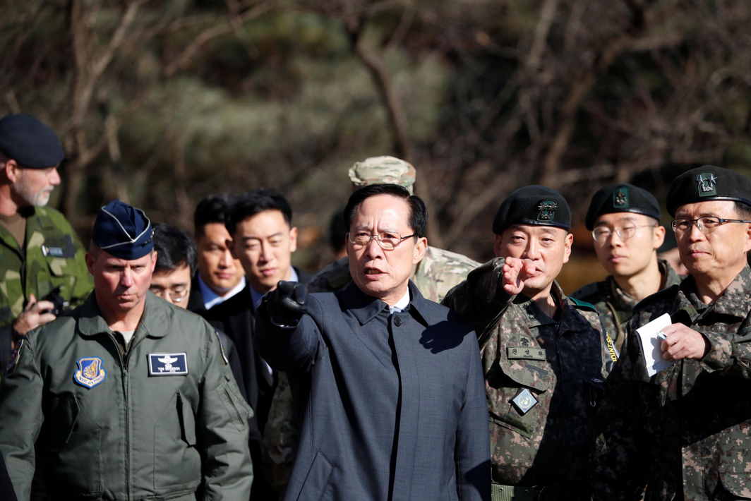 ENTRY POINT: South Korean Defence Minister Song Young-moo visits a spot where a North Korean has defected crossing the border on November 13, at the truce village of Panmunjom inside the demilitarised zone, South Korea, Reuters/UNI