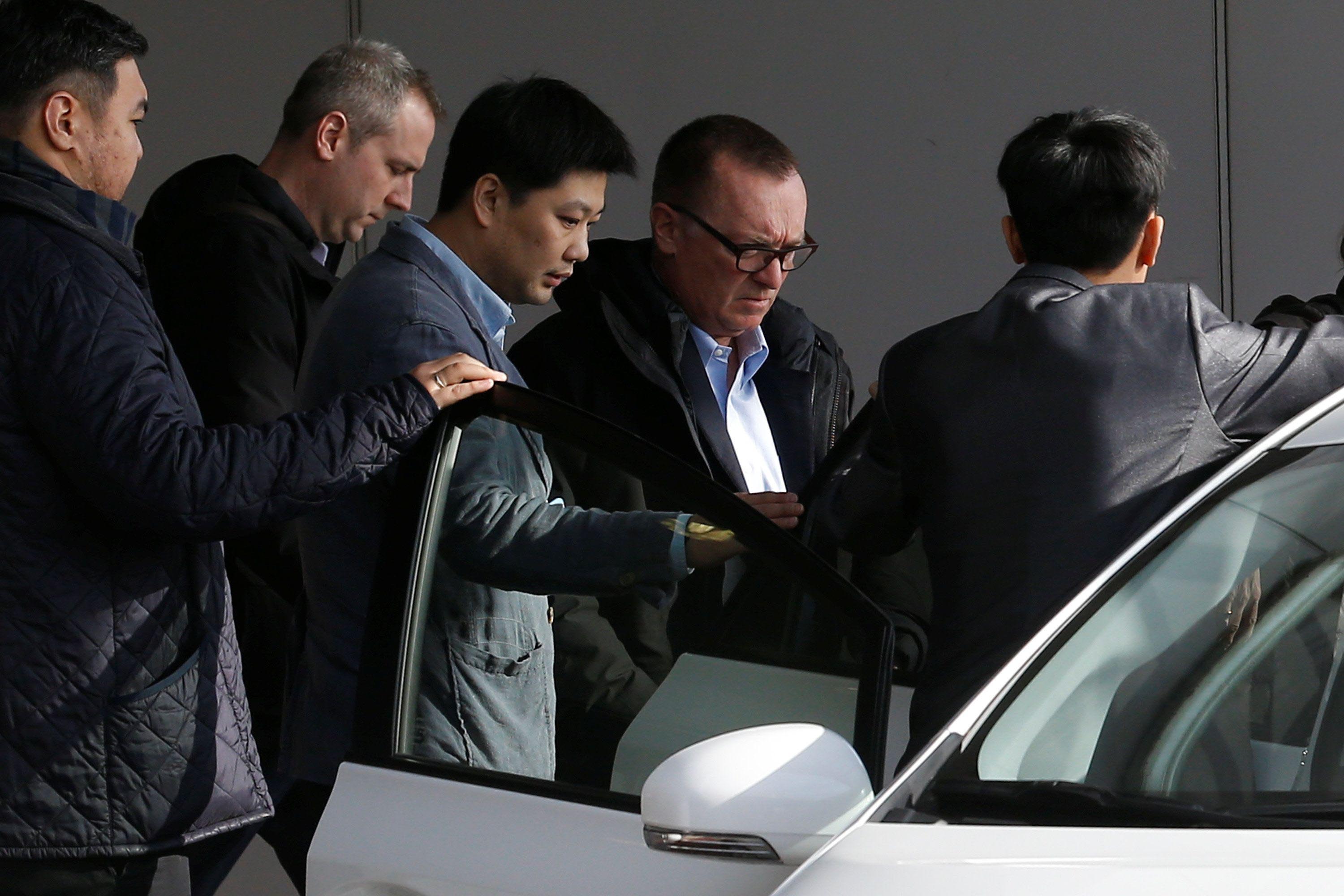 UPHILL TASK AHEAD: United Nations political affairs chief Jeffrey Feltman (2nd R) arrives at Beijing airport after his return from North Korea, Reuters/UNI