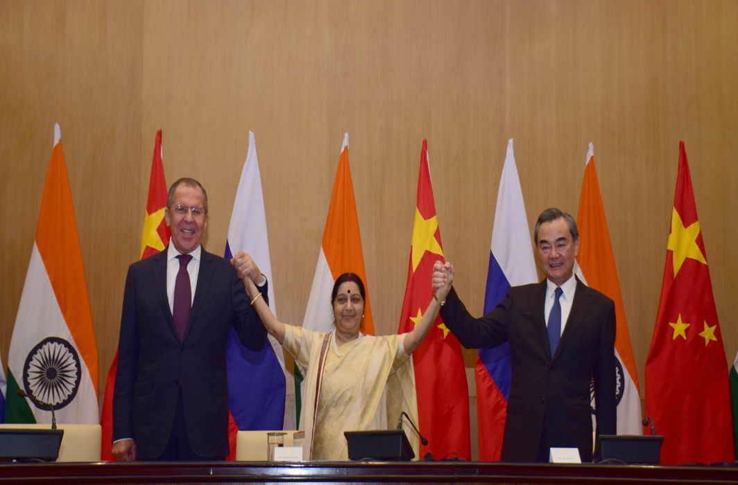 GOOD MORROW, FRIENDS: External affairs minister Sushma Swaraj with her Chinese counterpart Wang Yi and Russian counterpart Sergei Lavrov after a meeting, in New Delhi, UNI