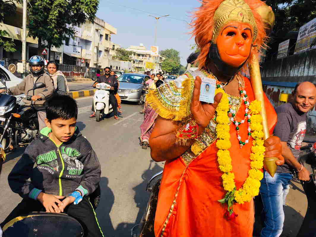 LORD’S LIEUTENANT: A man dressed as Lord Hanuman on way to cast his vote during second phase polling in the Gujarat assembly polls, in Ahmedabad, UNI