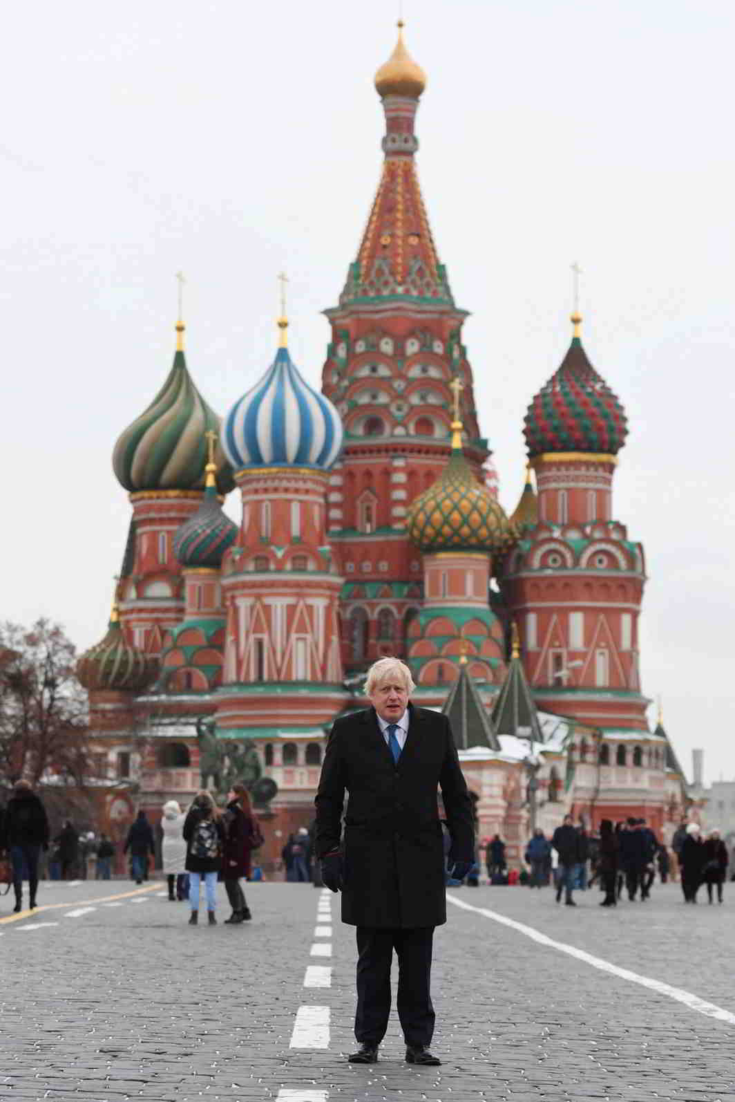 THOSE PRETTY ONIONS: Britain's Foreign Secretary Boris Johnson stands in front of St Basil's Cathedral during a visit to Red Square, in Moscow, Russia, Reuters/UNI