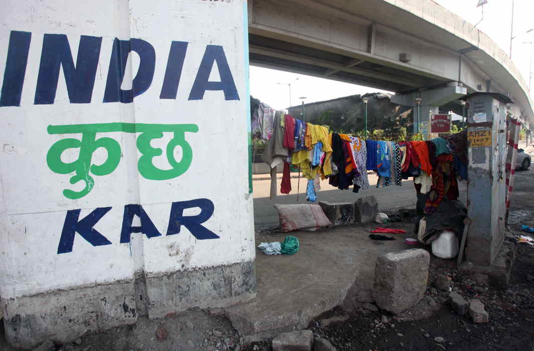 DIRT CHEAP: Clothes are hung to dry over the footpath by laundry services, in Mumbai, UNI