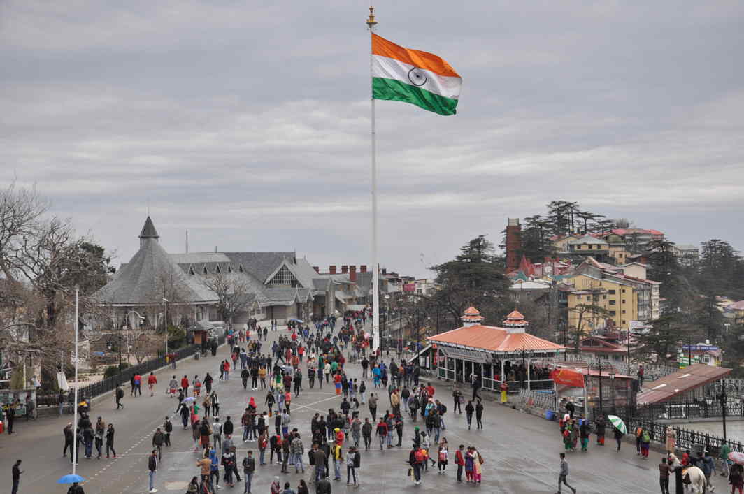 MISTY MONDAY: Tourists enjoy the Shimla weather on a cold winter afternoon under an overcast sky, at the Ridge in Shimla, UNI