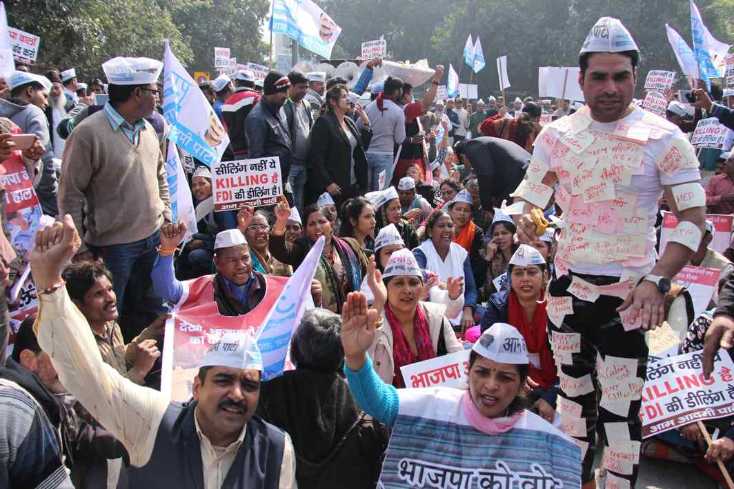 HAVE MERCY PLEASE: Aam Aadmi Party workers raise slogans during a demonstration in protest against the ongoing sealing of shops in Delhi, in New Delhi, UNI