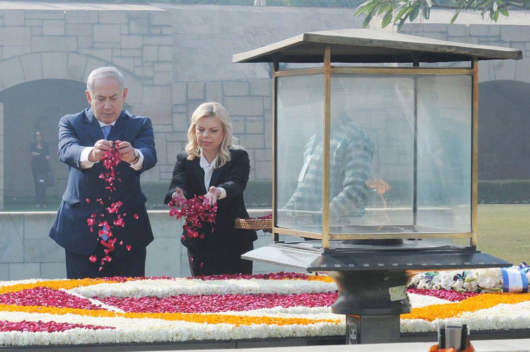 RESPECT: Prime Minister of Israel Benjamin Netanyahu pays floral tributes at the samadhi of Mahatma Gandhi at Rajghat, in New Delhi, UNI