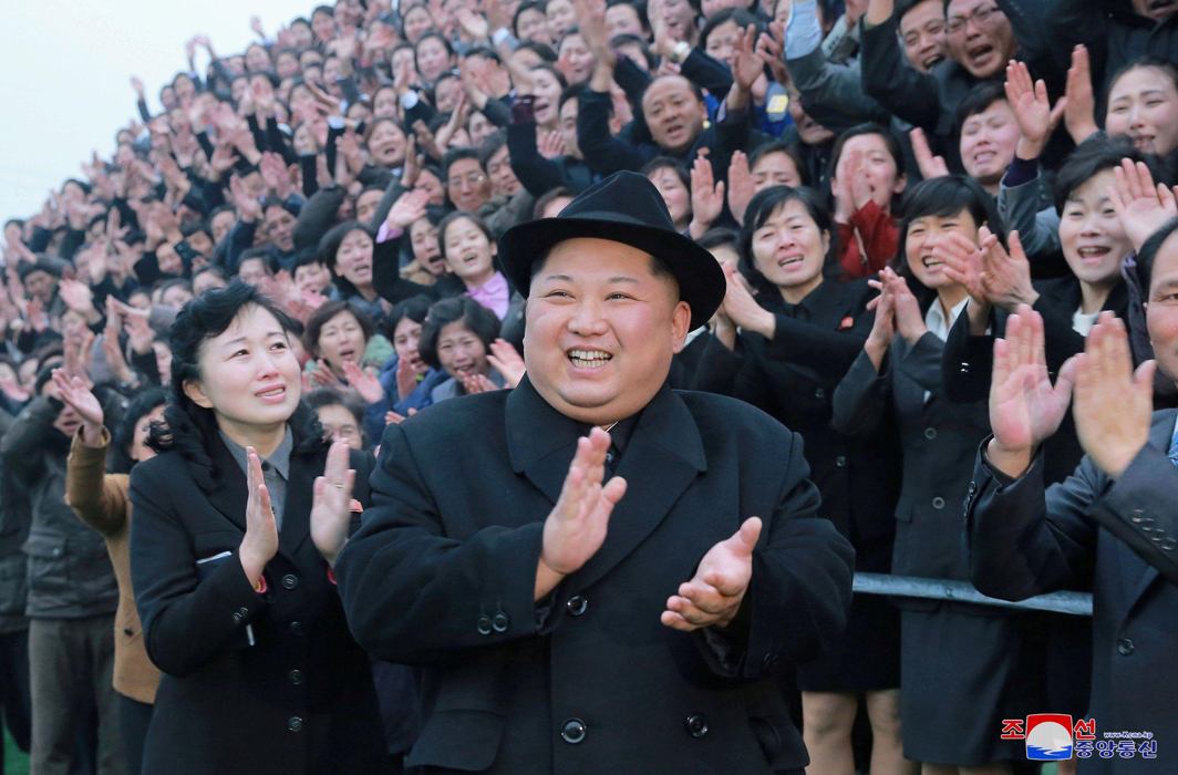HUMAN FACE: North Korean leader Kim Jong-Un reacts as people applaud during his visit to the newly-remodeled Pyongyang Teacher Training College, KCNA/Reuters/UNI