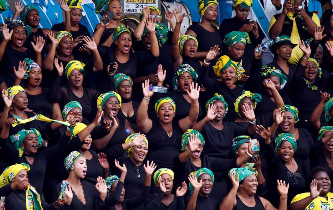 PROUD LEGACY: Supporters of the African National Congress sing ahead of the party's 106th anniversary celebrations, in East London, South Africa, Reuters/UNI