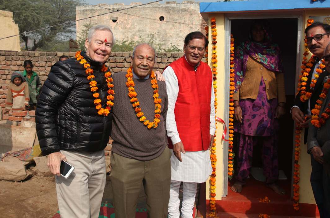 CHOSEN FEW: NRI Ved Nanda, who is selected for Padmabhushan award this year, William Korstad, member Rotary Club Denver, USA and Padmasbhushan Dr Bindeshwar Pathak, founder, Sulabh International, interact with village women after inauguration of 65 toilets funded by Rotary Club Denver, USA, at Indri village near Sohna, in Haryana, UNI