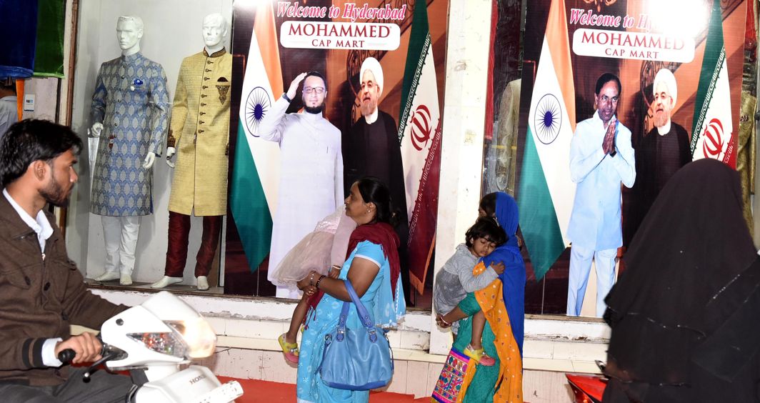 SPECIAL GUEST: Big size posters of Iran President Hassan Rouhani alongwith Telangana Chief Minister K Chandrashekar Rao and Hyderabad MP Asadduddin Owaisi are seen at the famous Mohammed Cap Shop, ahead of Rouhani's visit, in Hyderabad, UNI